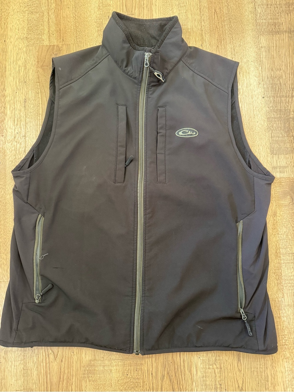 Black Drake Waterfowl Windproof Tech Vest with vertical chest pockets.